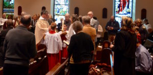 Reading the gospel photo